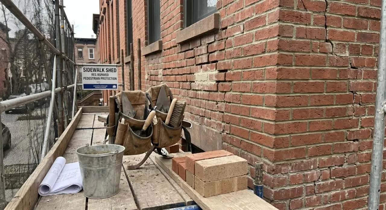 Restored brick facade on NYC residential building