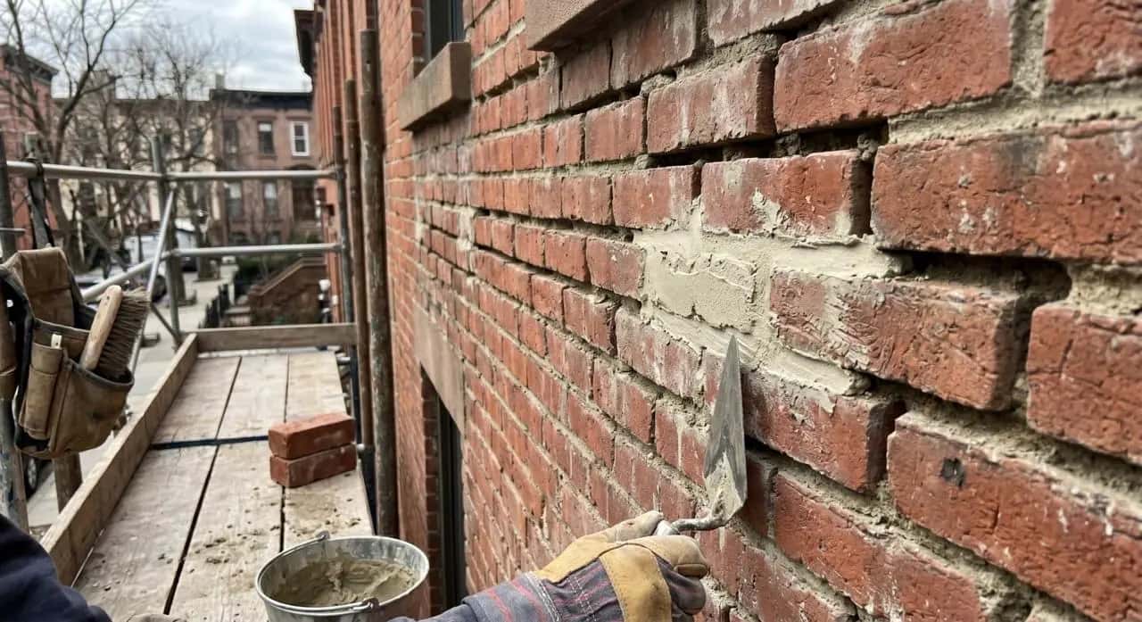 Masonry repair project on NYC building exterior